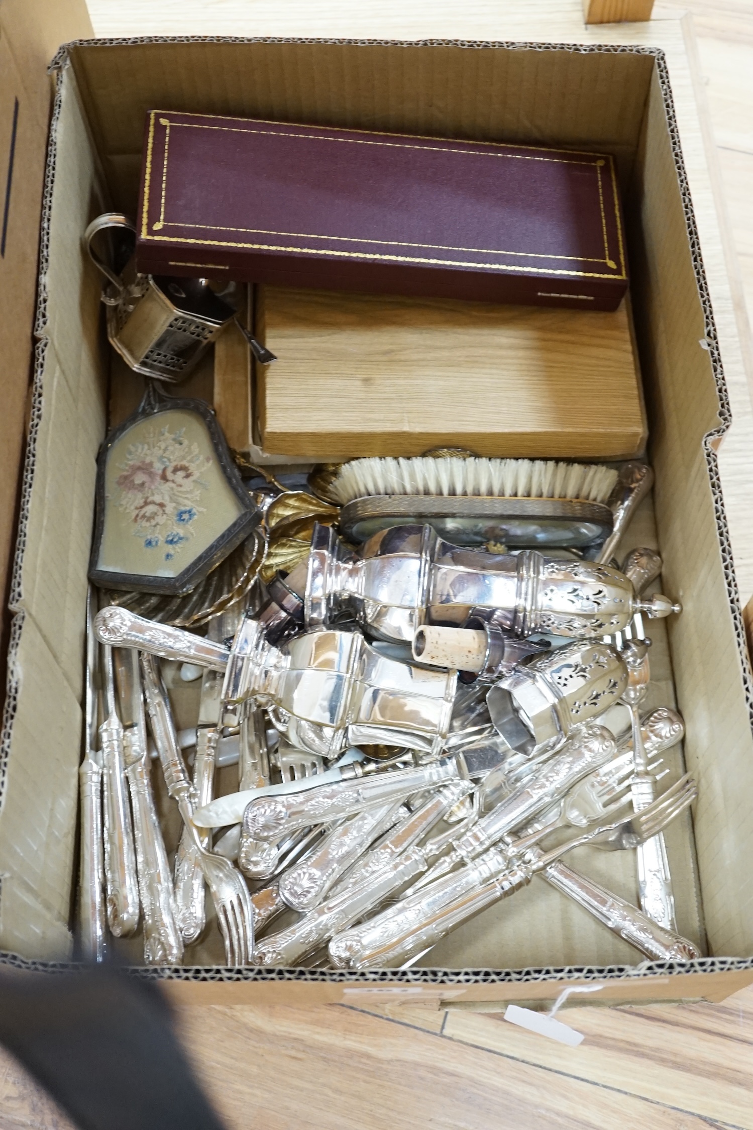 A quantity of plated ware including twelve pairs of fish eaters, a pair of sugar casters etc., together with two cased sets of six Asprey & Co mother of pearl butter knives. Condition - poor to fair to good